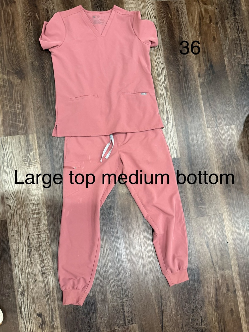 Women’s mauve figs see bleach stain on pants